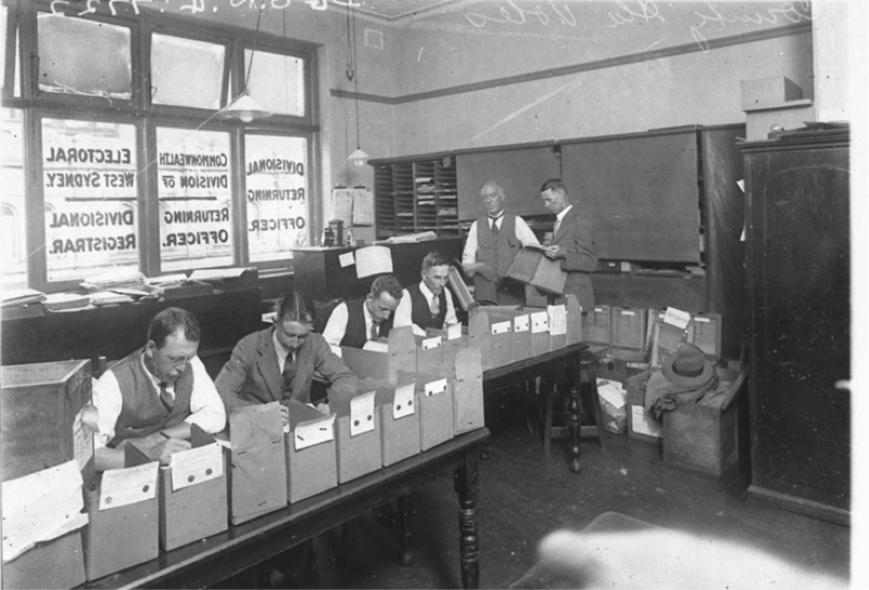Commonwealth clerks counting votes at a federal election, West Sydney Electoral Office, circs 1930s. Credit: Sam Hood, NSW State Library